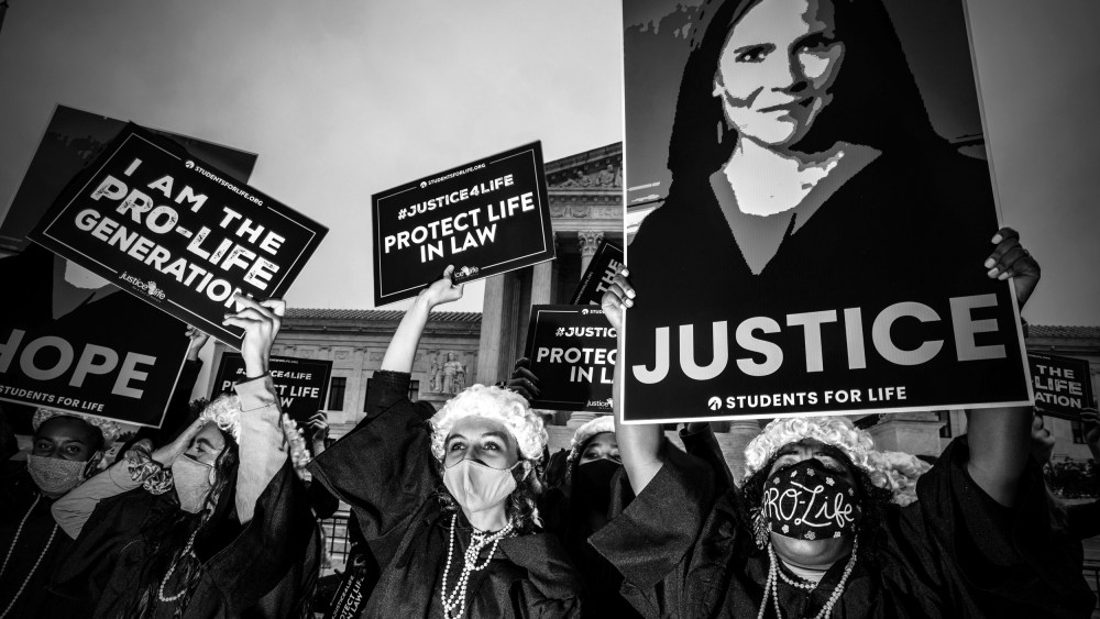 Image: Supporters of Judge Amy Coney Barrett gather outside of the Supreme Court as Senate confirmation hearings on her nomination began on Oct. 12, 2020.