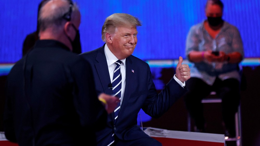Image: President Donald Trump gives a thumb up during a live one-hour NBC News town hall forum with a group of Florida voters in Miami, Fla.