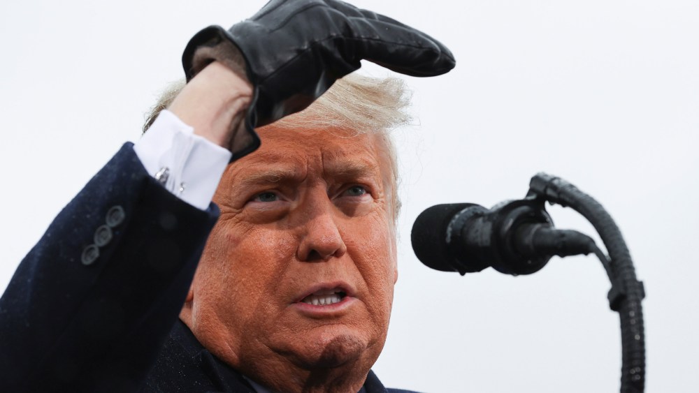 Image: U.S. President Donald Trump holds a campaign rally at Capital Region International Airport in Lansing, Michigan