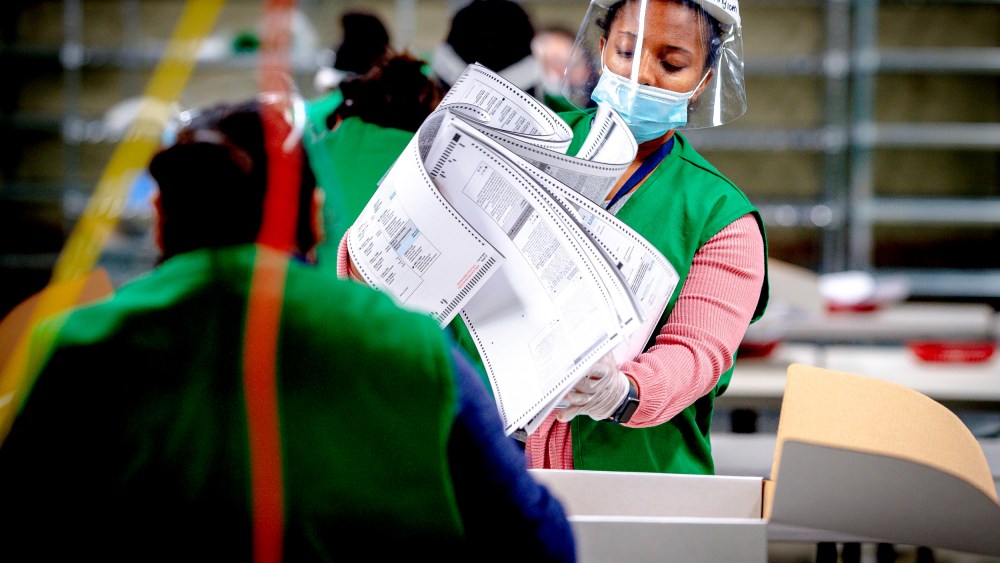 Image: Election workers process ballots in San Bernardino, Calif., on Election Day.