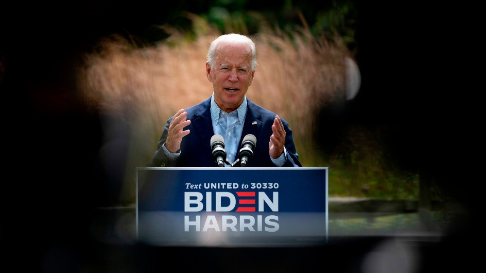 Image: Democratic presidential candidate Joe Biden speaks outside the Delaware Museum of Natural History in Wilmington, Del