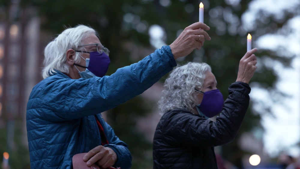 Image: Candlelight Procession Held To Remember Lives Affected By Coronavirus