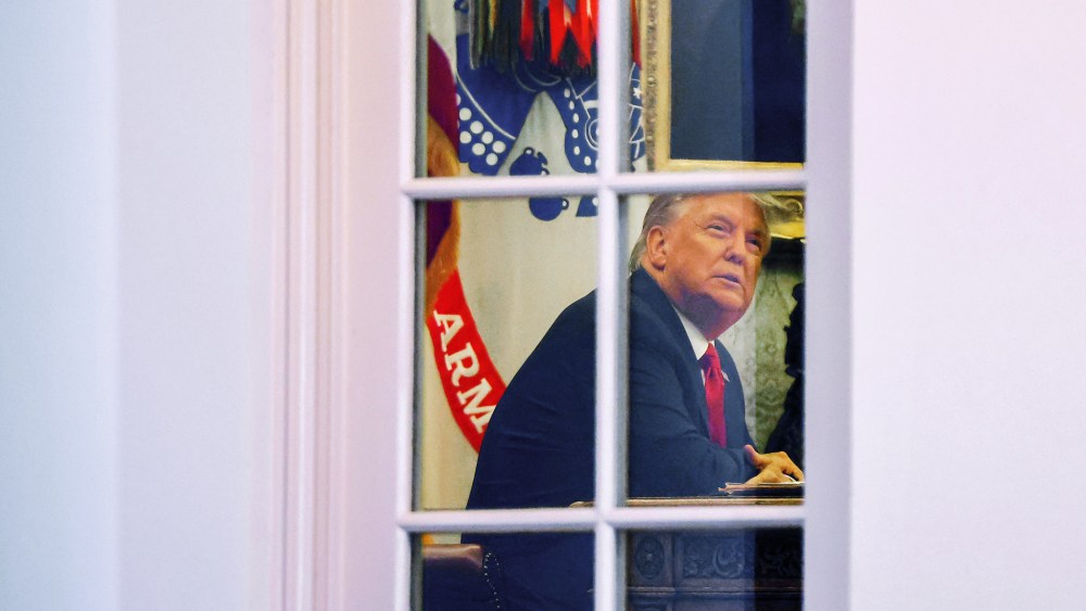 President Donald Trump sits at his desk in the Oval Office on Nov. 13, 2020.