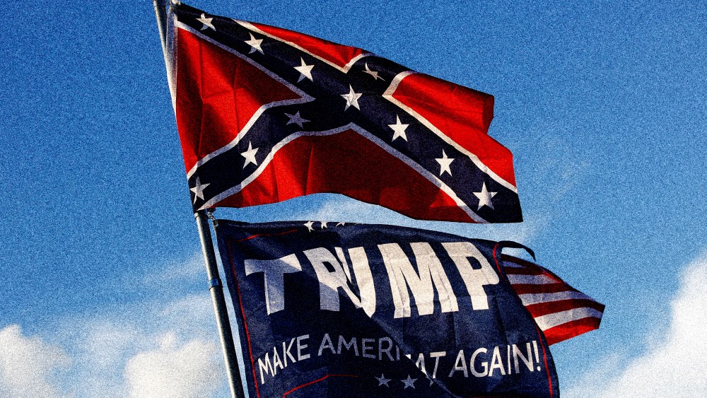 Image: A Trump "Make America Great Again!" flag flies below a confederate flag
