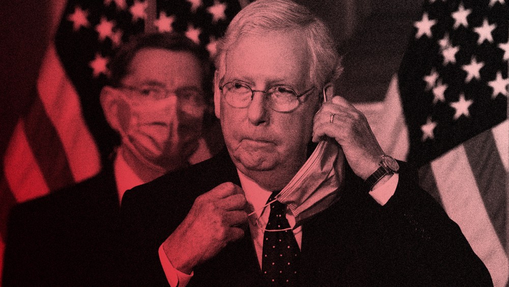 Image: Mitch McConnell taking off his mask