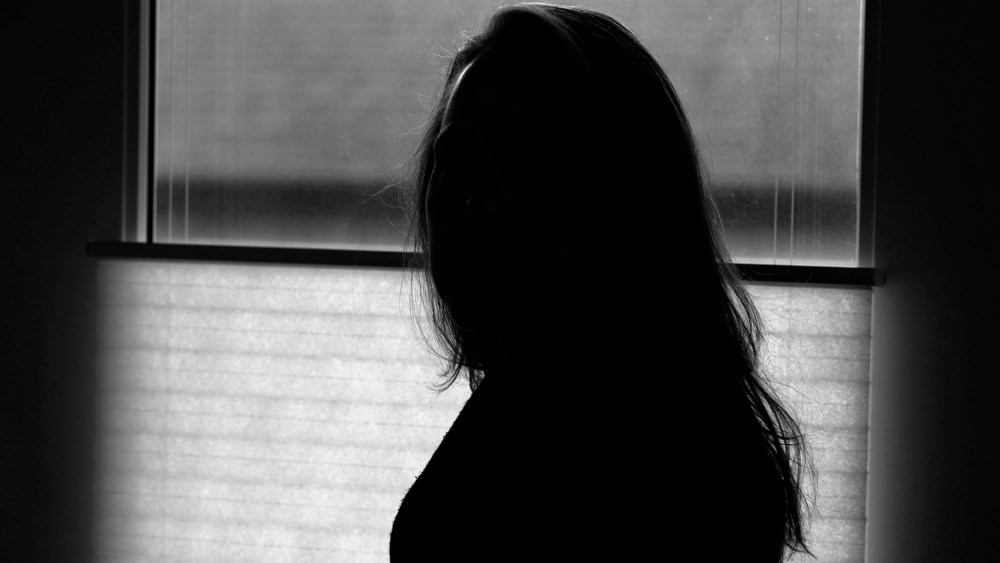 Image: A former FBI analyst, who asked to be identified only as Becky, on Dec. 9, 2020. Becky alleged that a FBI supervisory special agent licked her face and groped her at a colleague's farewell party in 2017 and was subsequently diagnosed with post-trau