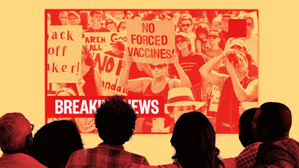 Image: A family watches news on screen where people are protesting vaccines.
