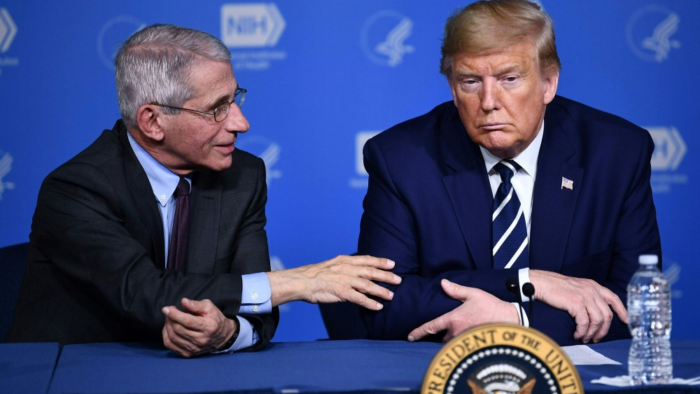 Image: President Donald Trump and Anthony Fauci, director of the NIH National Institute of Allergy and Infectious Diseases attend a meeting at the National Institutes of Health in Bethesda, Maryland
