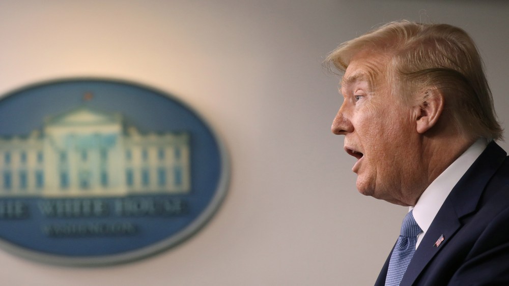 Image: President Donald Trump holds a news briefing on the coronavirus disease (COVID-19) while accompanied by members of the task force at the White House