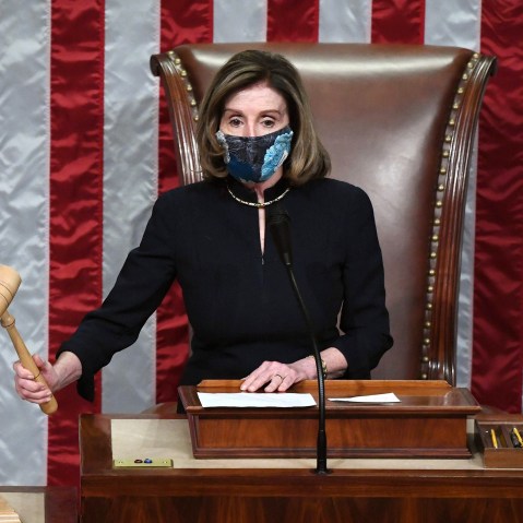Image: House Speaker Nancy Pelosi gavels in the final vote of President Donald Trump's impeachment at the Capitol