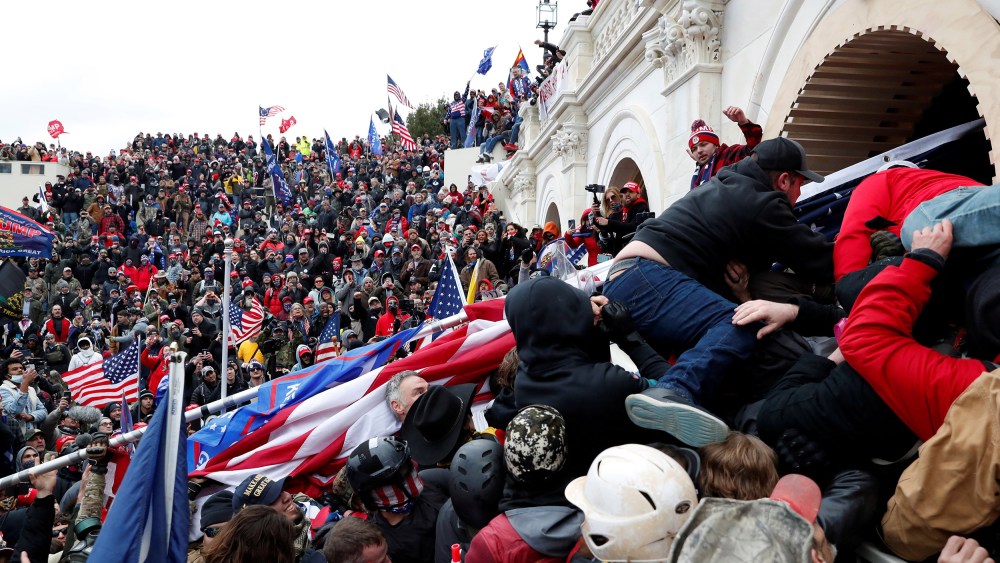 Image: Pro-Trump protesters storm into the U.S. Capitol during clashes with police, during a rally to contest the certification of the 2020 U.S. presidential election results.