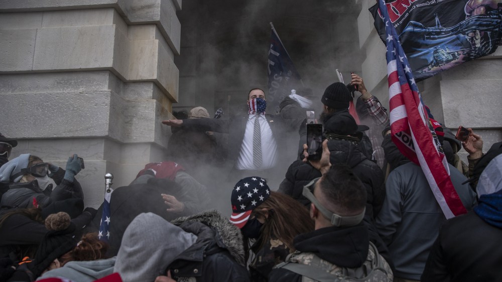 Image: Demonstrators attempt to break into the U.S. Capitol
