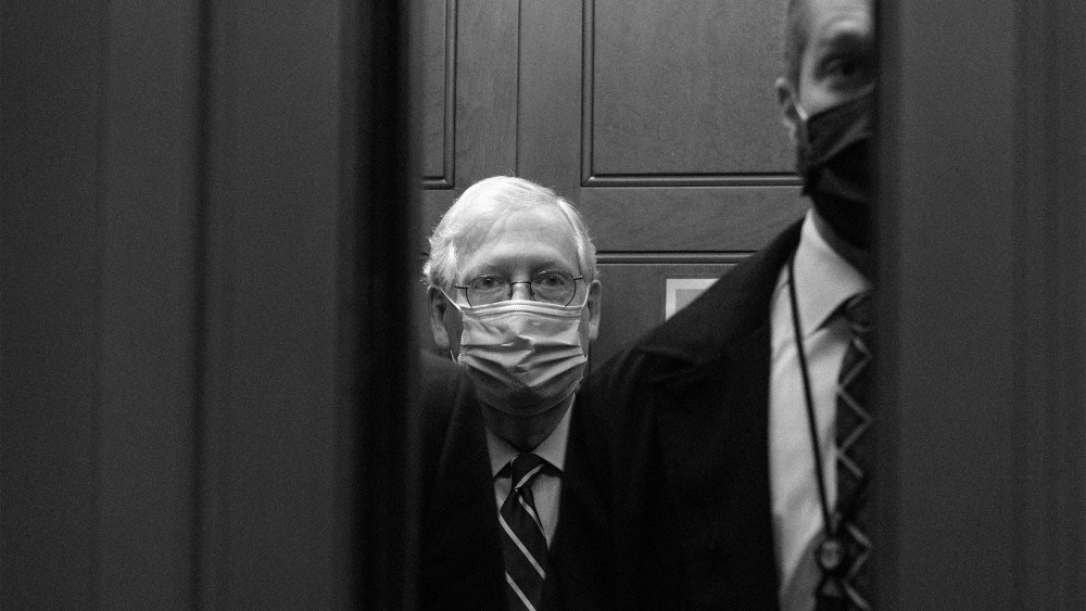 Image: Mitch McConnell boards an elevator after leaving the Senate floor.