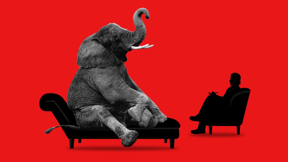Photo illustration of an elephant sitting on a couch with a therapist.