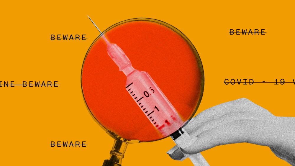 Photo illustration of a magnifying glass with a red lens over a hand holding a vaccine. Text around it that reads "Beware", "Covid-19 vaccine", has been crossed out.