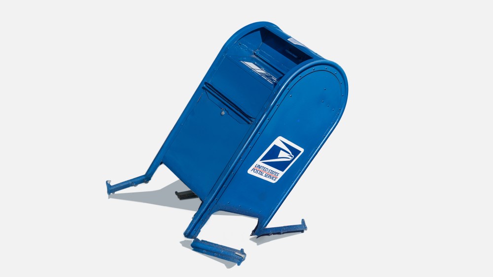 Photo illustration of a broken United States Postal Service mailbox.
