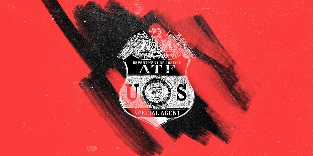 Photo illustration of a red layer being removed off a badge against a black dusty background . The badge reads,"Department of Justice ATP U.S. Special Agent. A seal on it reads, "Bureau of Alcohol, Tobacco, Firearms and Explosives, 1972".