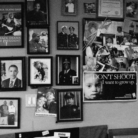 Image: Photographs at the Ebony Barber Shop in the Fifth Ward, a historic Black community, in Evanston, Illinois, on March 17, 2021.