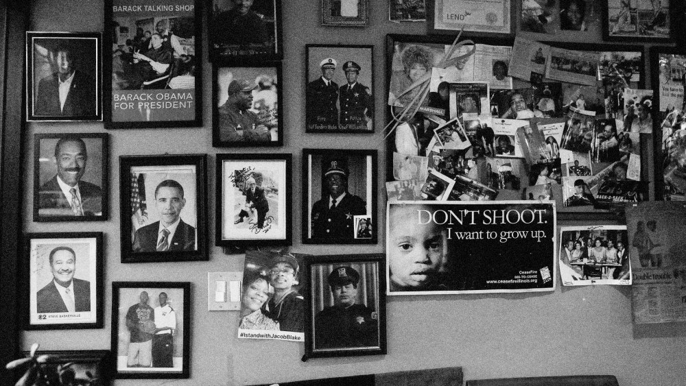 Image: Photographs at the Ebony Barber Shop in the Fifth Ward, a historic Black community, in Evanston, Illinois, on March 17, 2021.