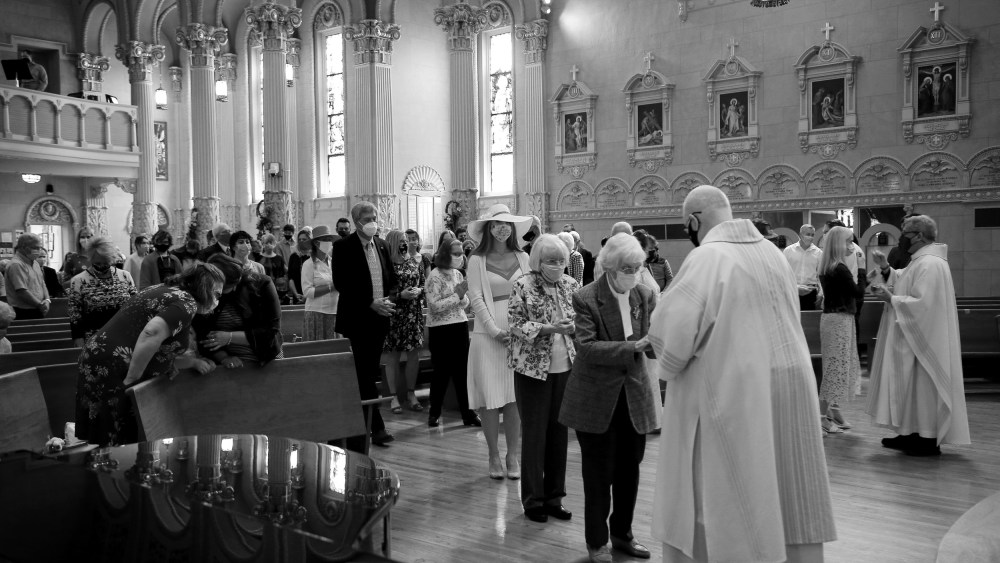 Image: Worshippers at an Easter Sunday service at St. James Catholic Church in Louisville, Ky., on April 4, 2021.