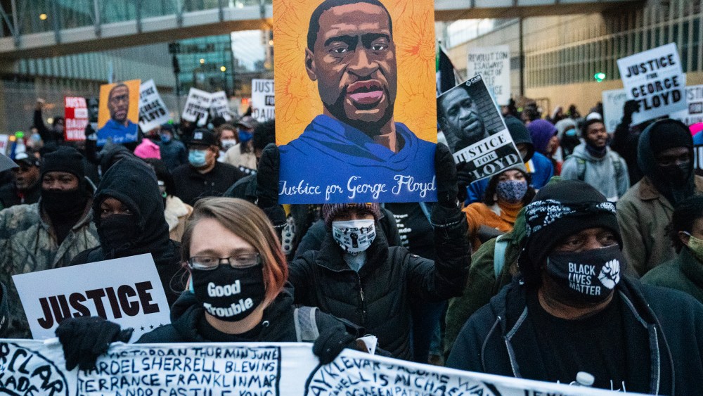 Image: Protesters march around downtown Minneapolis near the courthouse calling for justice for George Flyod after closing arguments in the Chauvin trial has ended