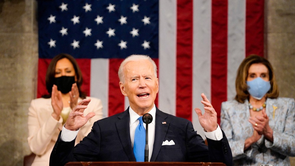 Image: Vice president Kamala Harris and Speaker of the House Nancy Pelosi applaud as President Joe Biden addresses a joint session of Congress at the U.S. Capitol on April 28, 2021.