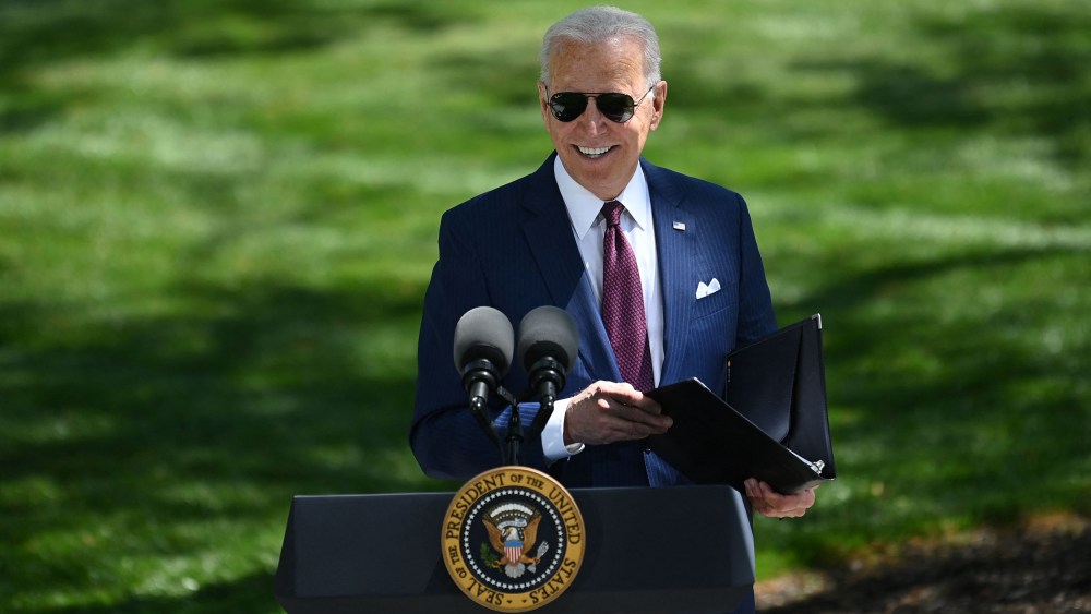 Image: President Joe Biden arrives to deliver remarks on the Covid-19 response outside the White House on April 27, 2021.