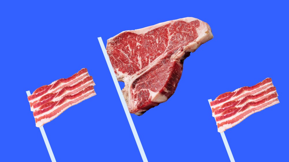 Photo illustration: Three flags made of steak and bacon strips.