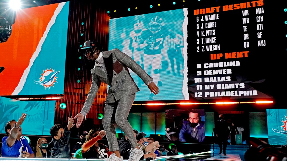 Image: Jaylen Waddle greets fans after being selected by the Miami Dolphins in the 2021 NFL Draft in Cleveland on April 29.
