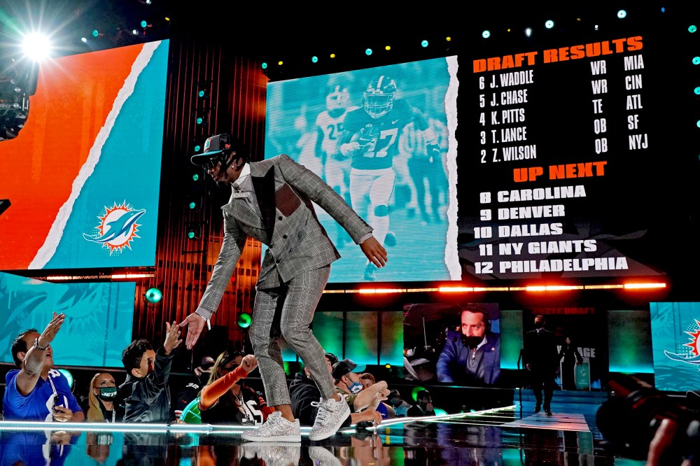 Image: Jaylen Waddle greets fans after being selected by the Miami Dolphins in the 2021 NFL Draft in Cleveland on April 29.