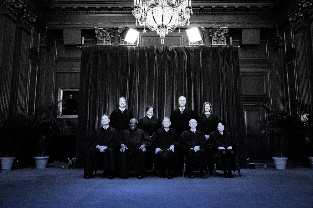 IMage: The Supreme Court Justices pose for a group photo in Washington on April 23, 2021.