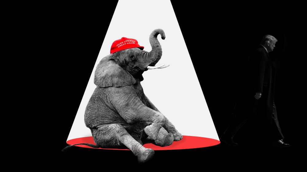 Photo illustration: An elephant sits under the spotlight wearing a red hat that reads,"Make America Great Again" as Donald Trump walks into the shadow..