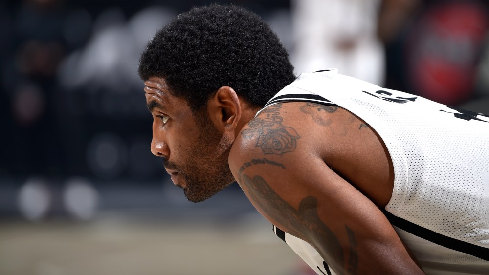 Image: Kyrie Irving of the Brooklyn Nets looks on during a game.
