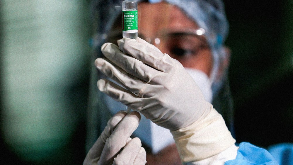 Image: A health official draws a dose of AstraZeneca's Covid-19 vaccine in Colombo, Sri Lanka, on Jan. 29, 2021.