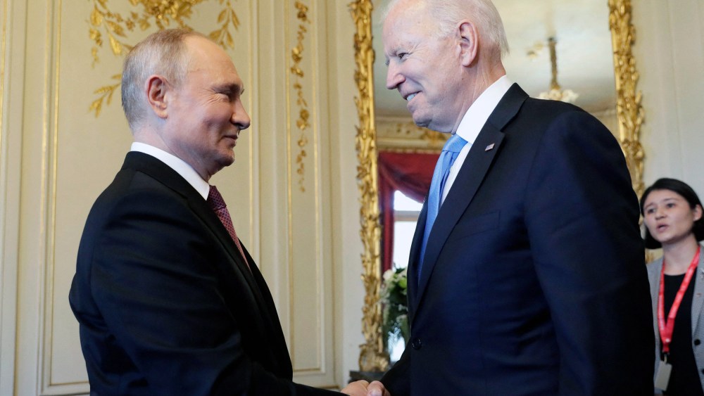 Image: Russian President Vladimir Putin shakes hands with President Joe Biden during their meeting at the 'Villa la Grange' in Geneva, Switzerland,