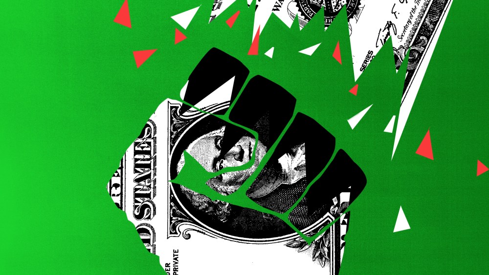 Photo illustration: Pieces of a torn note fall over a raised fist which has another piece of the torn note.