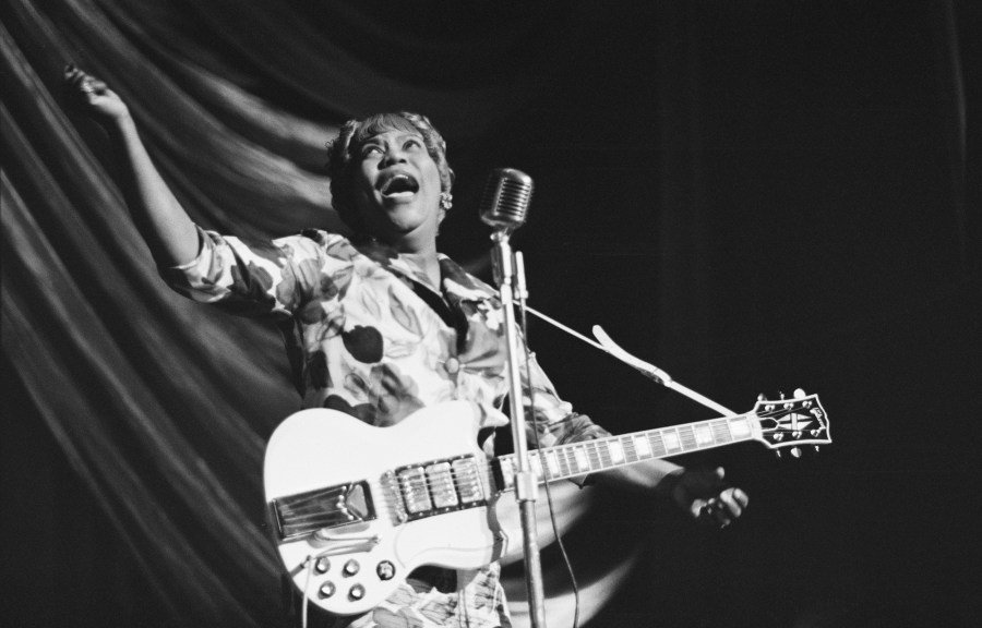 American gospel singer Sister Rosetta Tharpe performs at a Blues and Gospel Caravan tour in the U.K. in 1964.