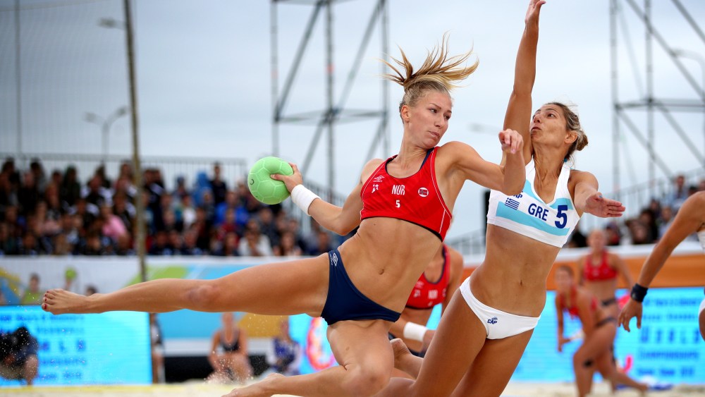 Image: Norway's Marielle Mathisen plays a shot during the 2018 Women's Beach Handball World Cup Final against Greece in Kazan, Russia.