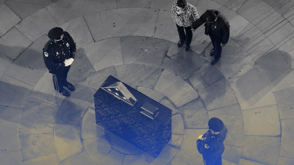 Image: People mourning during a ceremony for Capitol officer Brian D. Sicknick in the Rotunda of the U.S. Capitol.