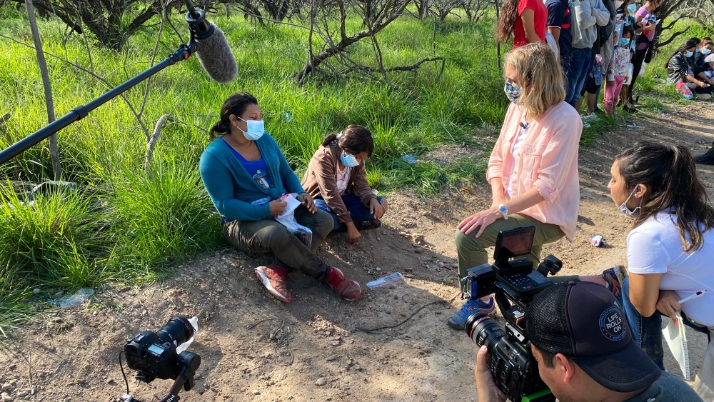 NBC News correspondent Julia Ainsley speaks with migrants at the southern border in July 2021.