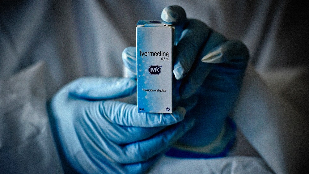 Image: A health worker holds a bottle of Ivermectin in Cali, Colombia, on July 21, 2020.