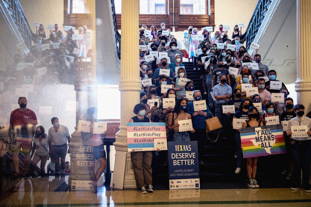 Image: Activists gather at the Texas State Capitol in Austin to protest Republican-led efforts to pass legislation that would restrict the participation of transgender student athletes in sports on Sept. 20, 2021.