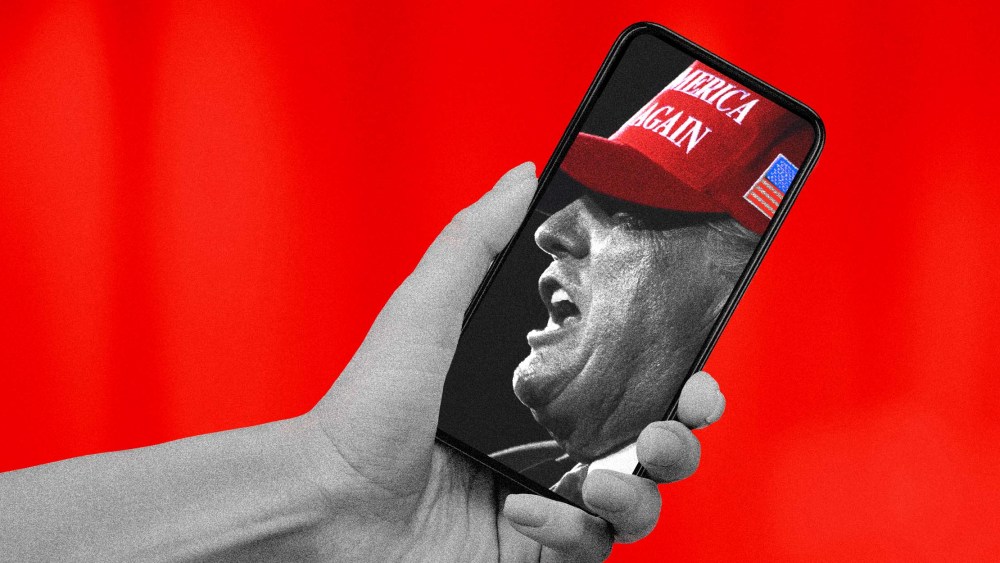 Illustration of a hand holding a phone showing former President Donald Trump speaking at a campaign rally.