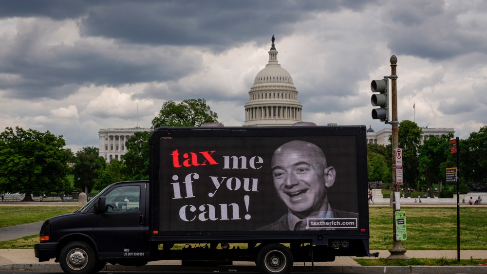 Image: Mobile Billboard Moves Around DC In Tax Day Protest