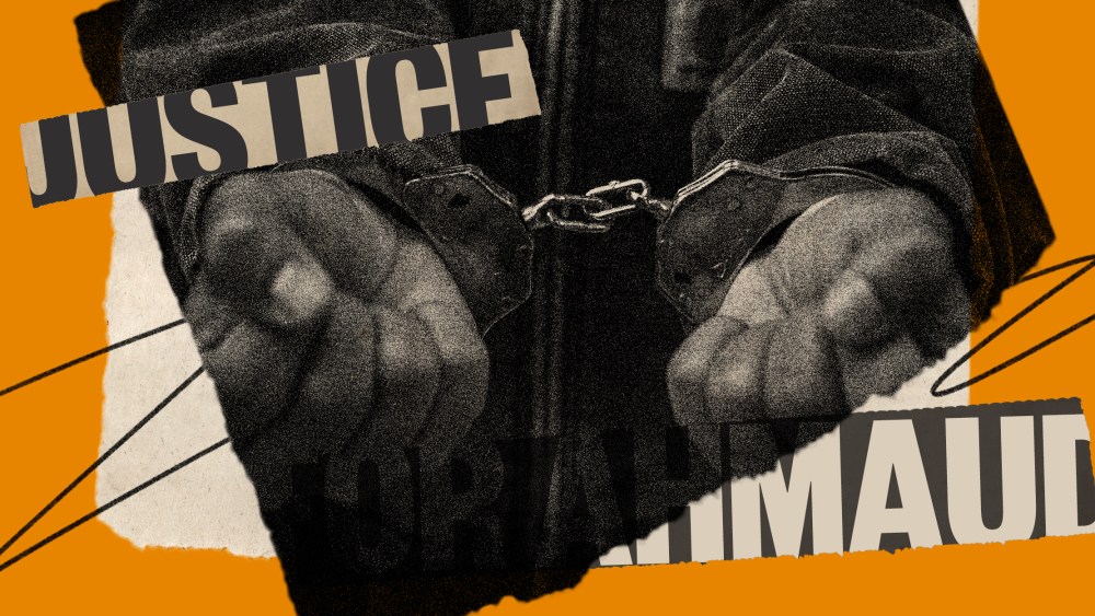 Photo illustration: Image of hands in handcuffs, two pieces of paper partially read the words,"Justice" and "Ahmaud".