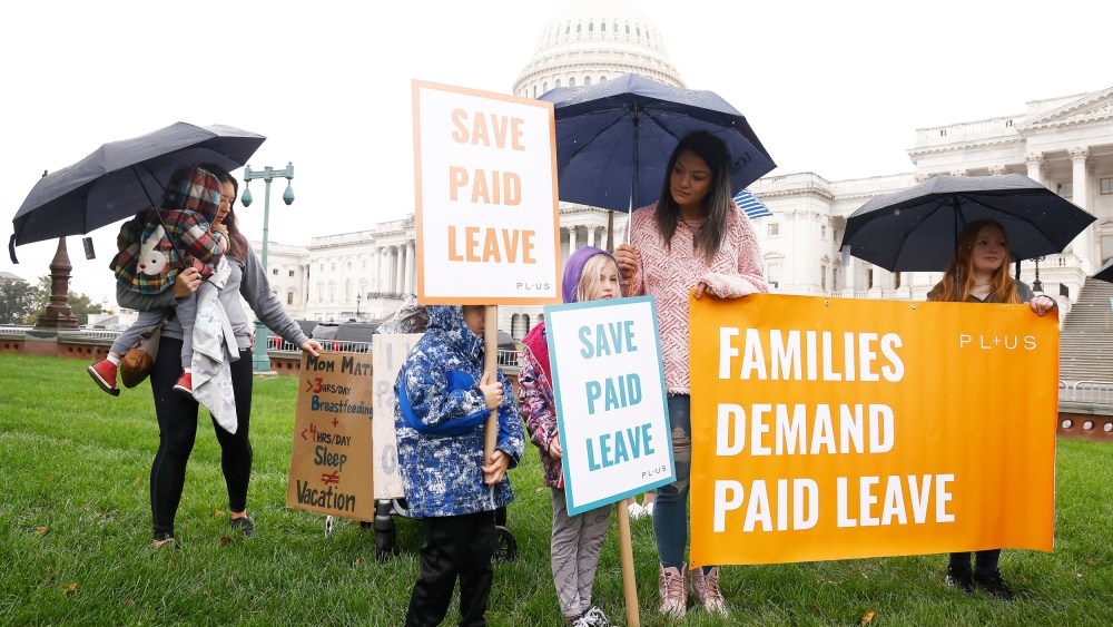 Families, parents, and caregivers rally on Capitol Hill to call on Congress to include paid family and medical leave in the Build Back Better legislative package on Nov. 2, 2021.