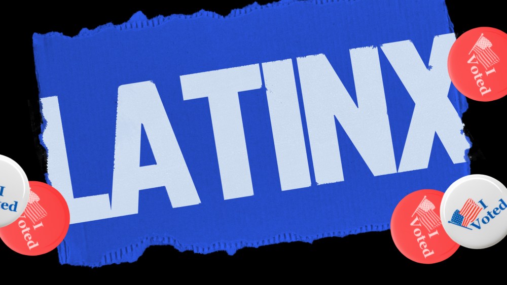 Photo illustration: A blue cardboard piece with the text,"Latinx" with a few badges lying around that read,"I Voted".