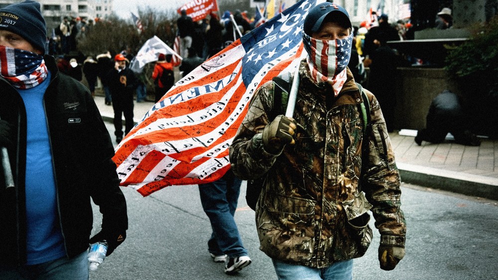 IMage: People protest in Washington on the eve of the presidential election certification on Jan. 5, 2021.