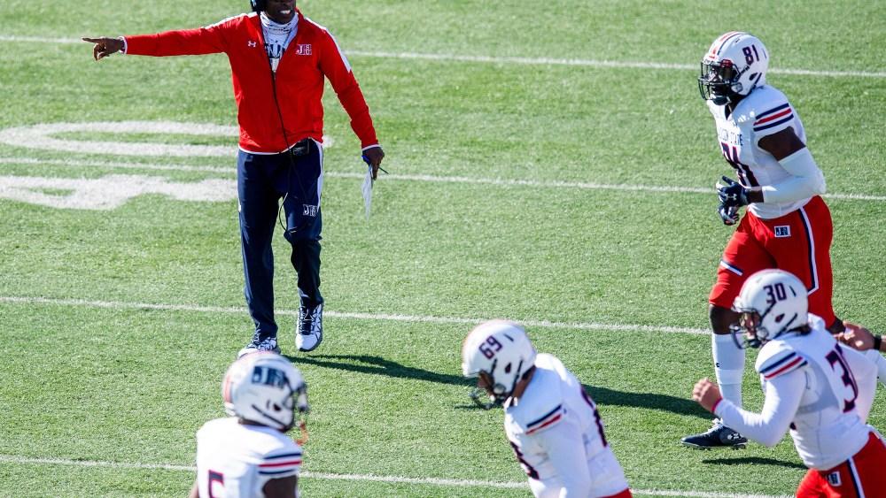 Image: Jackson State head coach Deion Sanders coaching his team.