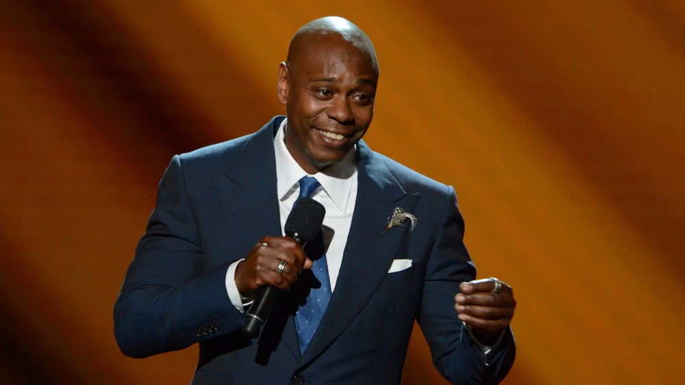 Image: Dave Chappelle on stage.